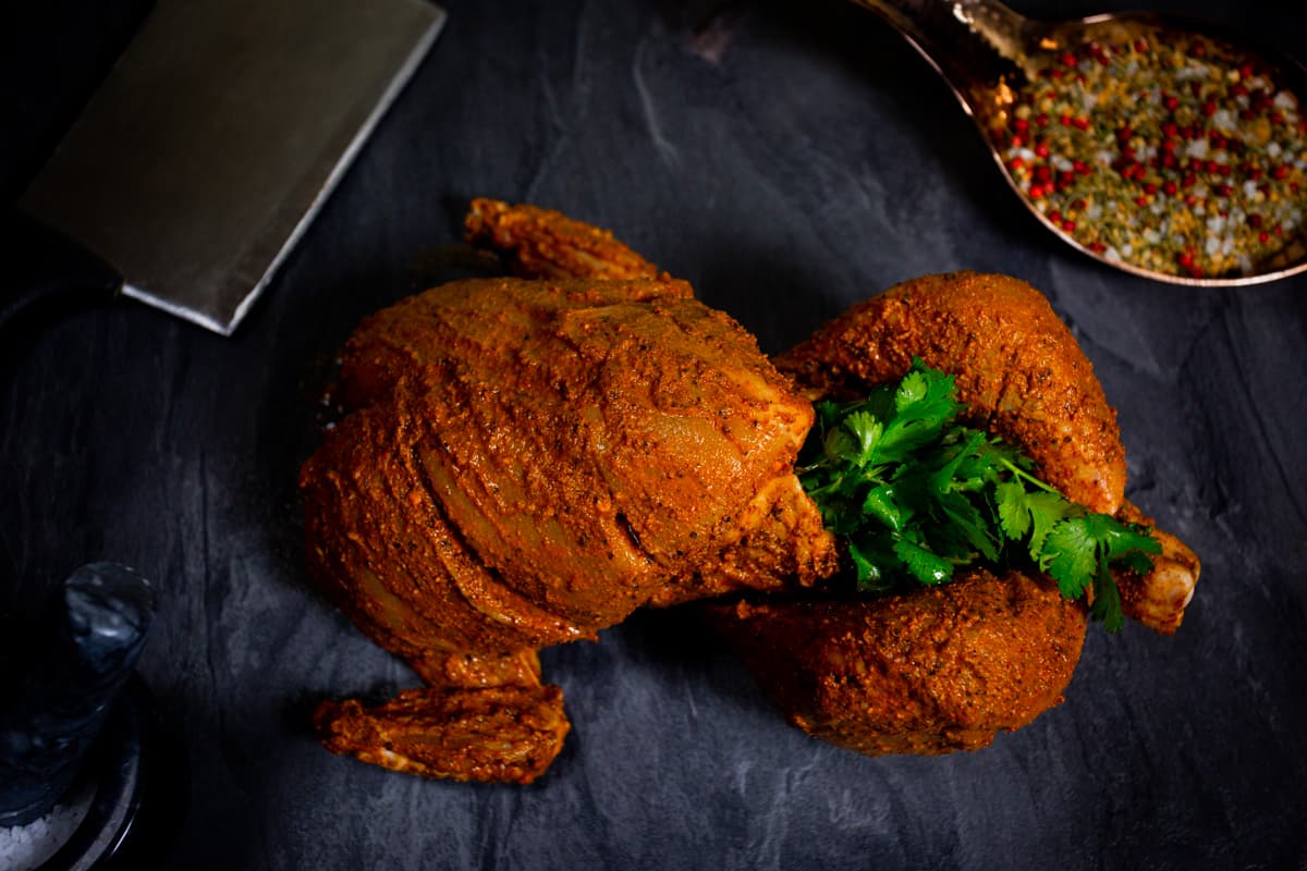 Harissa & Chilli Stuffed Whole Chicken